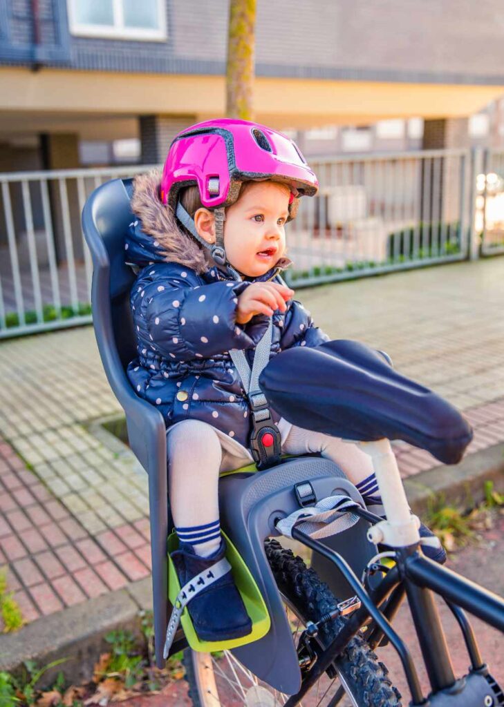 Child in a rear mount E-bike Child Seat