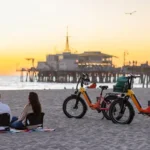 Heybike Horizon Fat Tire Folding Ebike on the beach watching sunset