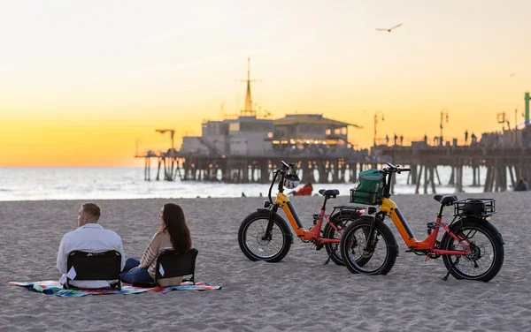 Heybike Horizon Fat Tire Folding Ebike on the beach watching sunset