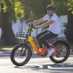 Man riding his Heybike Horizon Fat Tire Folding Ebike in the suburbs